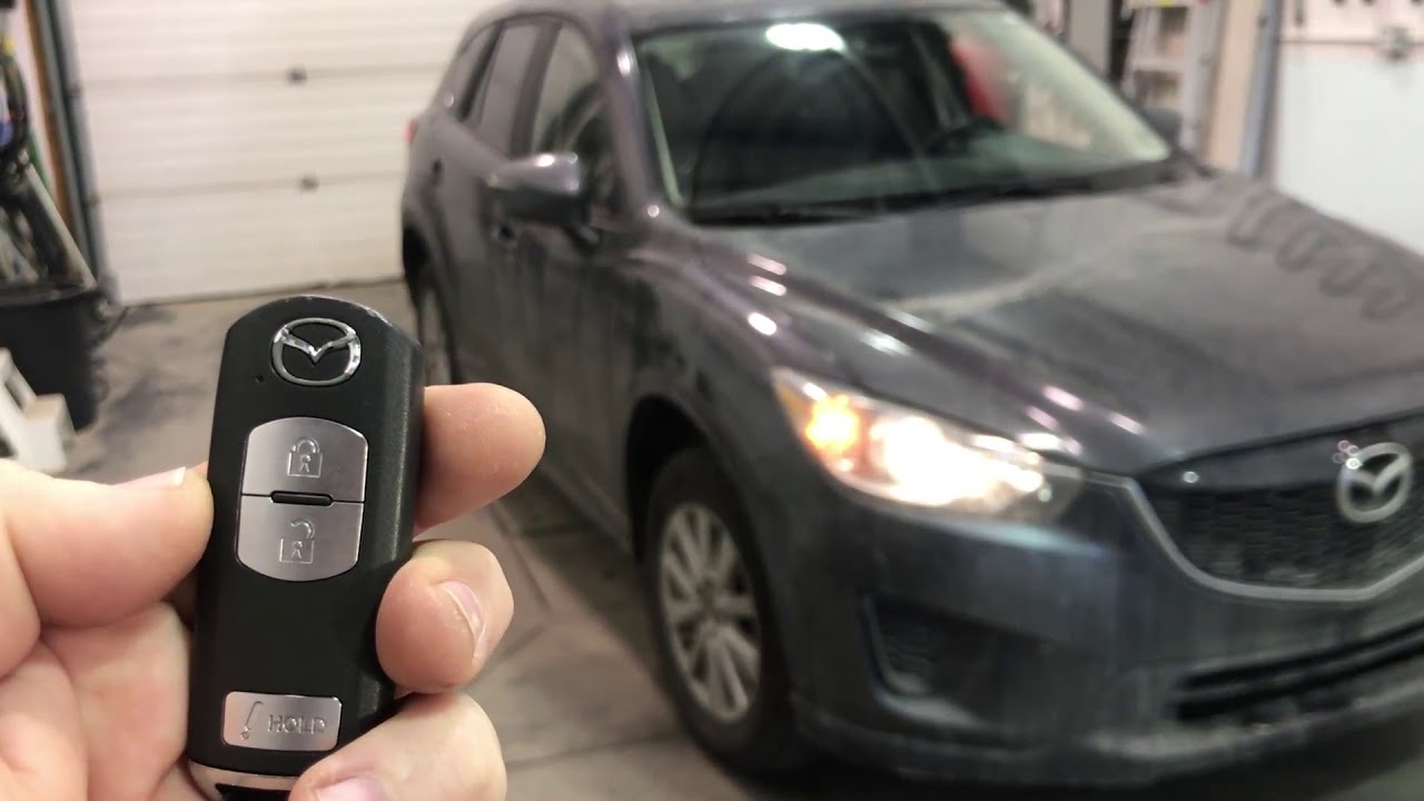 Блокировка Mazda CX5 3X, дистанционный запуск двигателя с заводским брелоком.