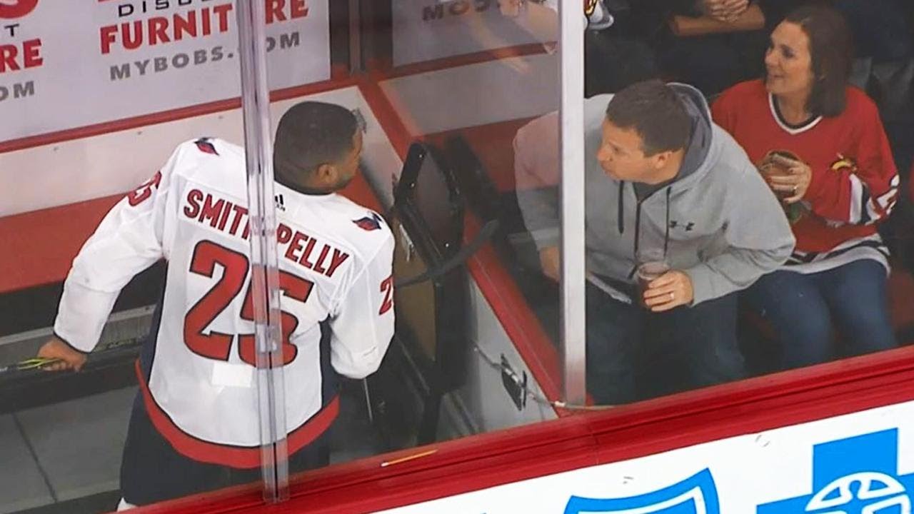 Fans get the boot after harassing Smith-Pelly in penalty box