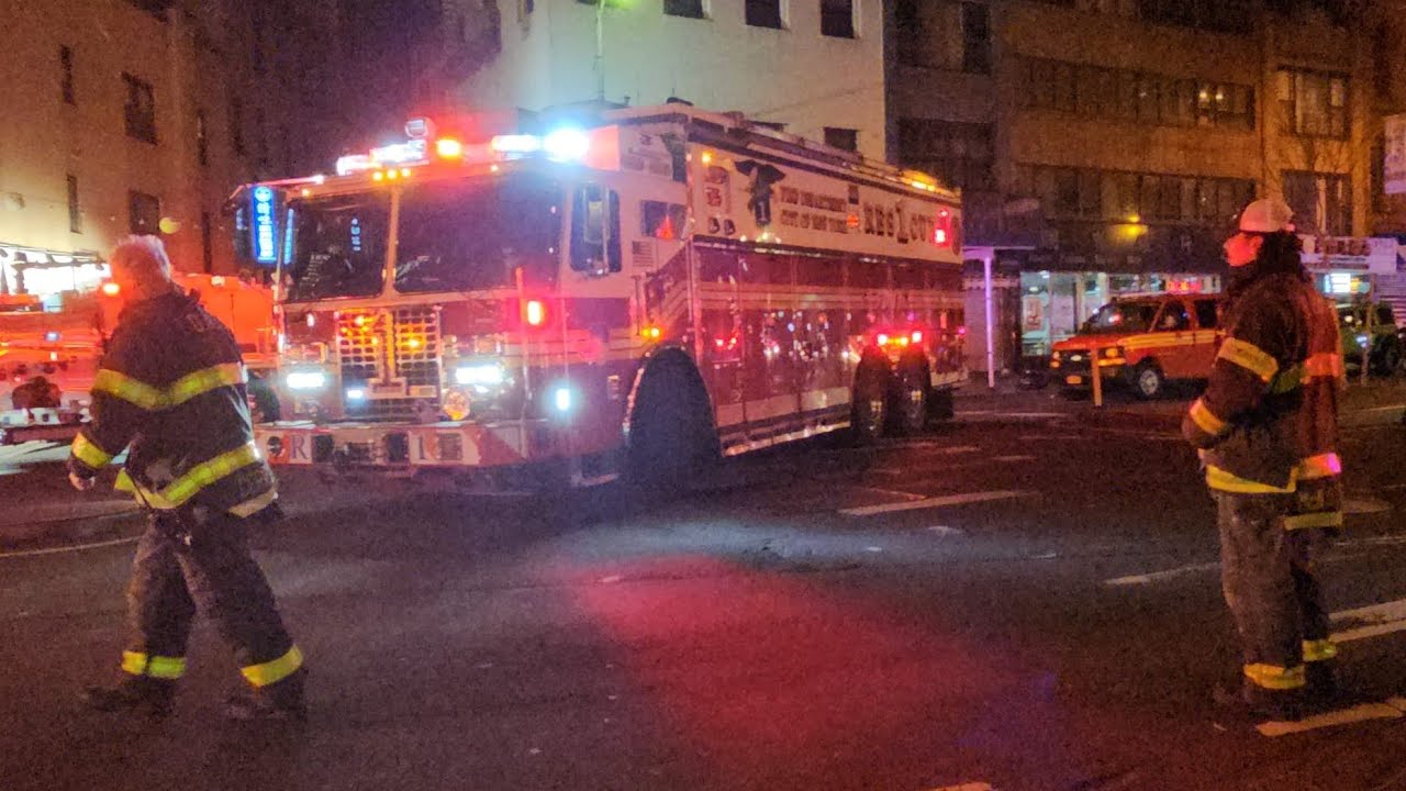 FDNY Rescue Company 1 Leaving From An All Hands Fire On Bowery In Chinatown, Manhattan, NYC