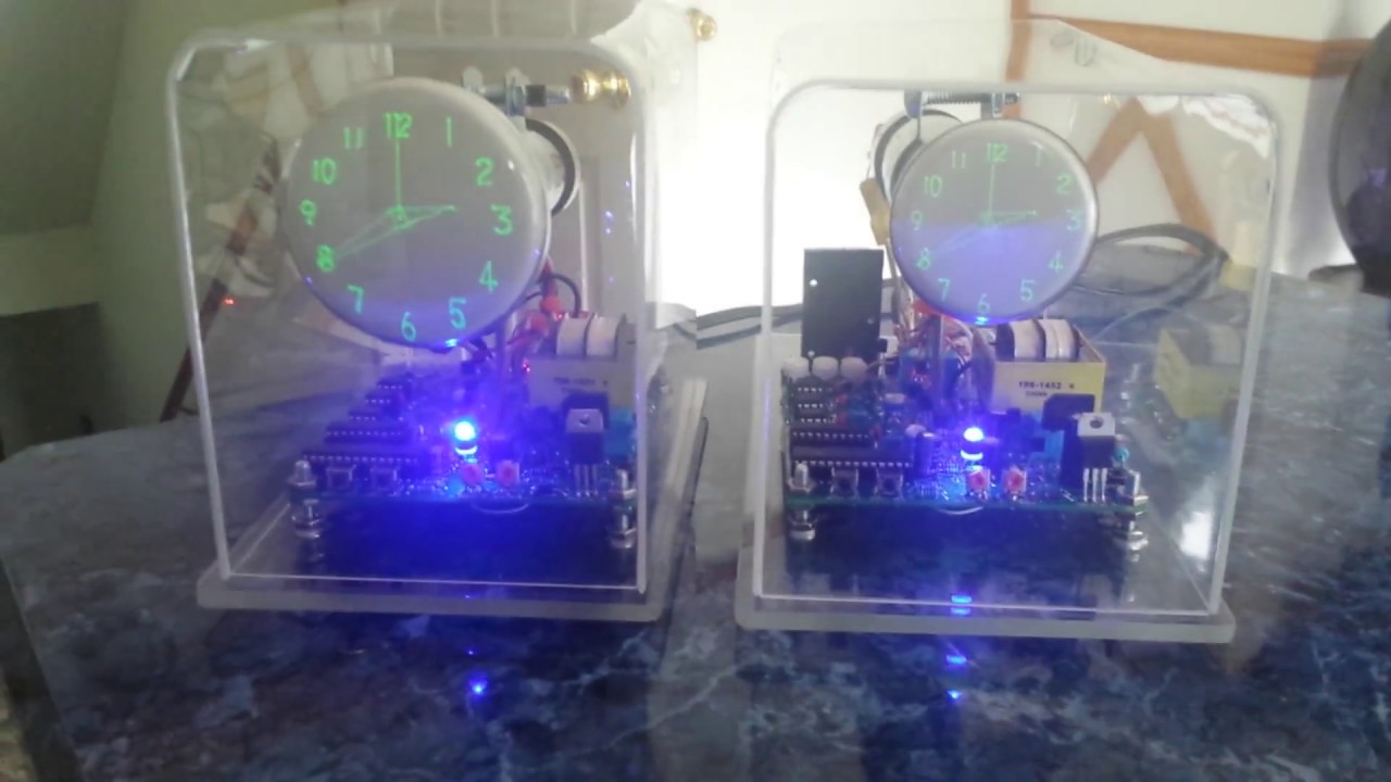 Two oscilloscope clocks with gps modules attached, timed by 1pps from gps module.