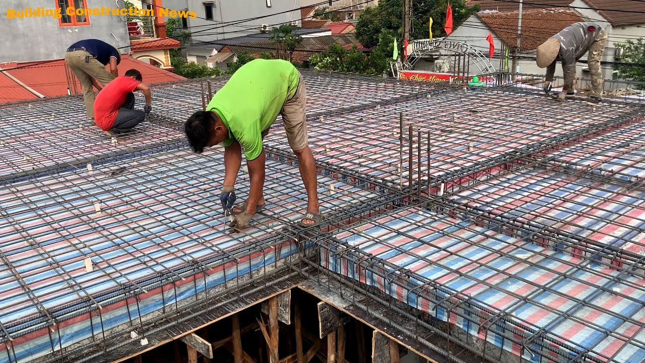 Workers Build And Finish A Modern Concrete Ceiling - Using Iron Sand And Gravel And Cement