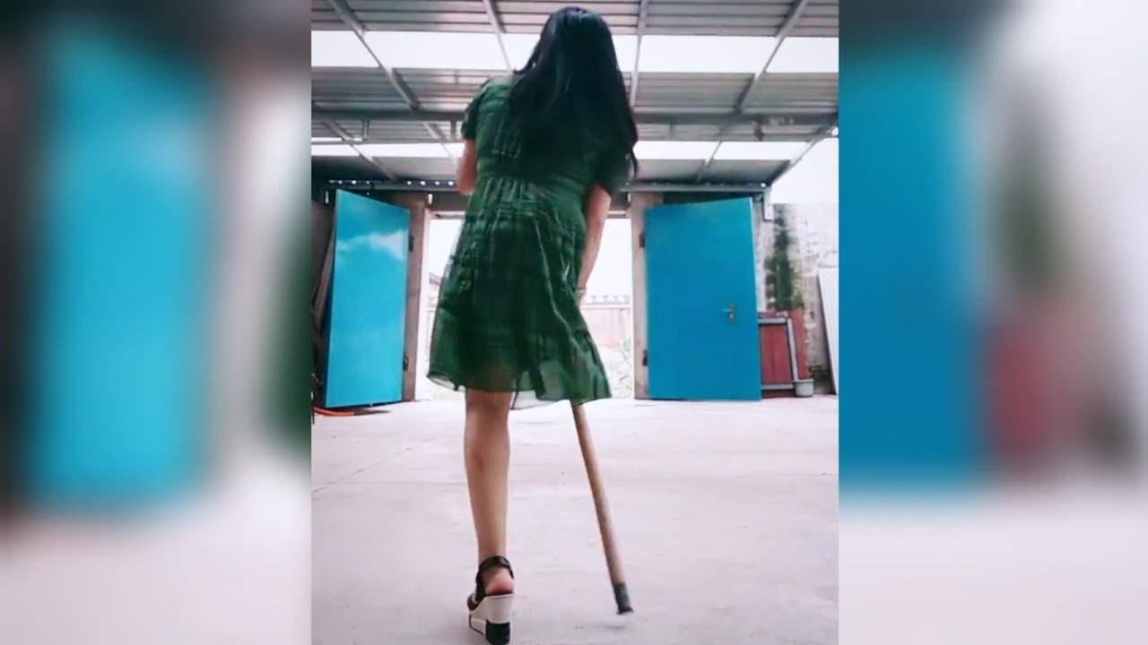 Amputee Girl's Strange But Stylish Walk with a Stick
