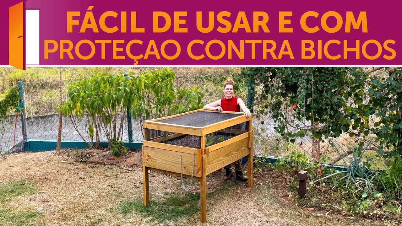 Horta elevada de madeira com tela