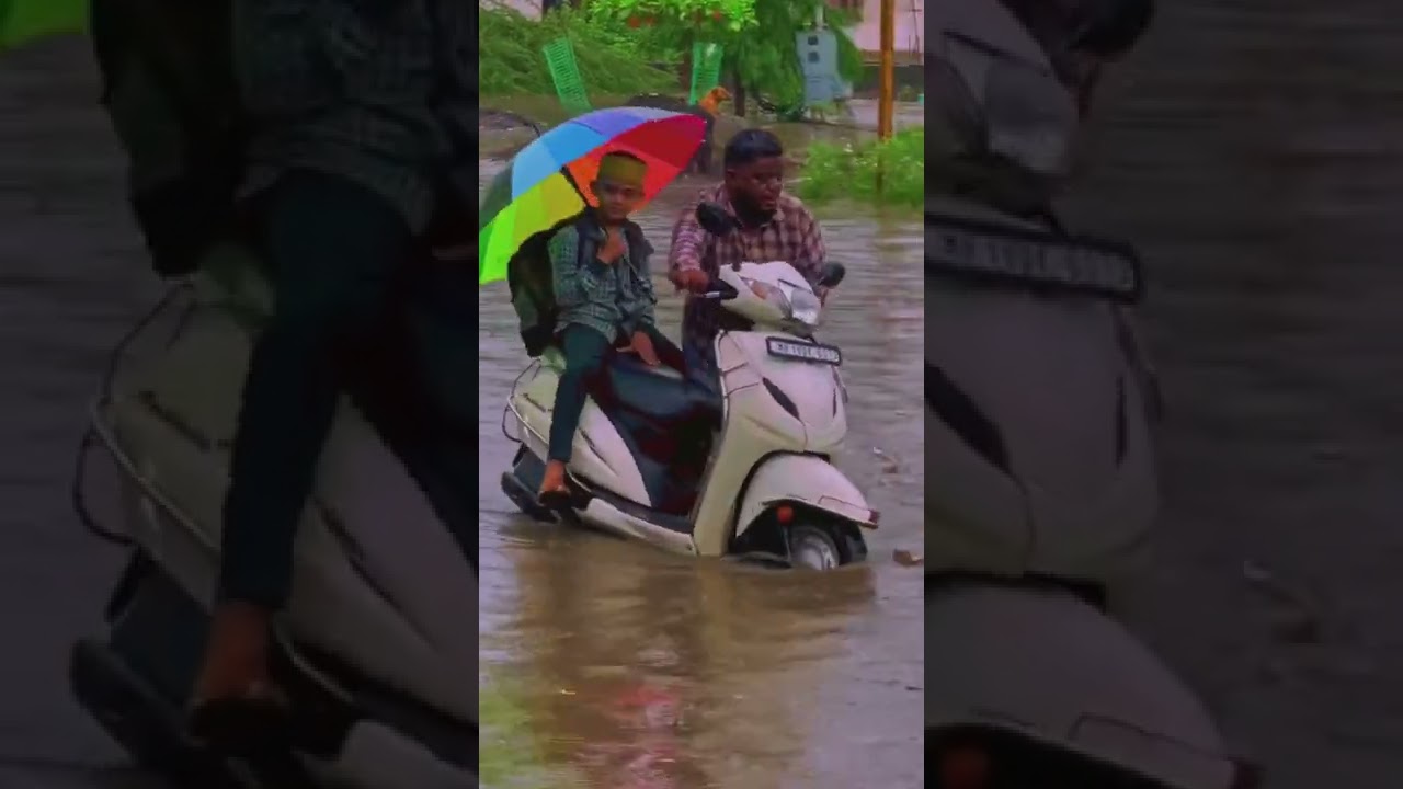 Shorts | Viral Video Of A Father Dragging His Scooter On A Water-logged Road | Trending Shorts