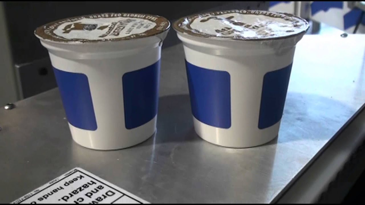700VS Labeling Tapered Containers