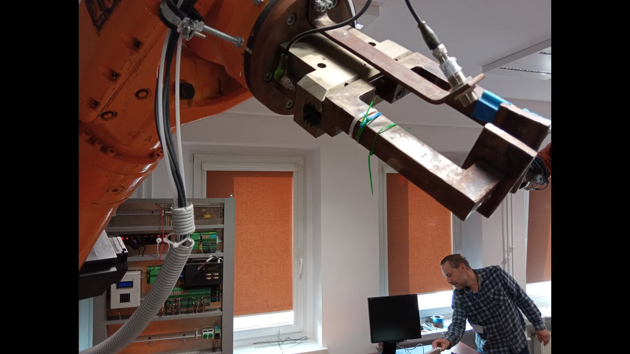 Task for KUKA robot: an intelligent program for juggling tennis balls on a table