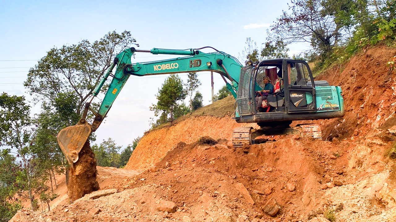 Kobelco Excavator Operator Carves Perfect Mountain Road | Excavator Working Video