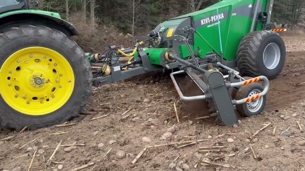 Kivi Pekka rock picking in Michigan   Corn stalks and hard dirt