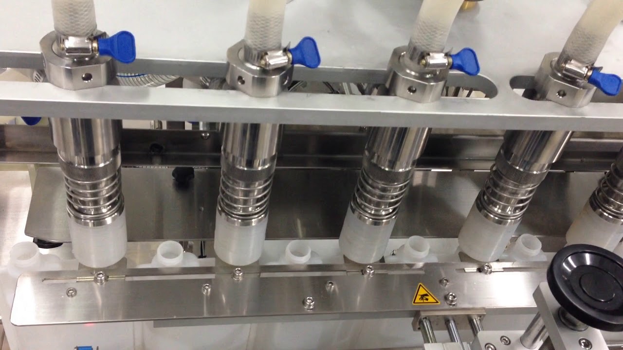 Automatic overflow filling machine for special container 自動六頭充填機