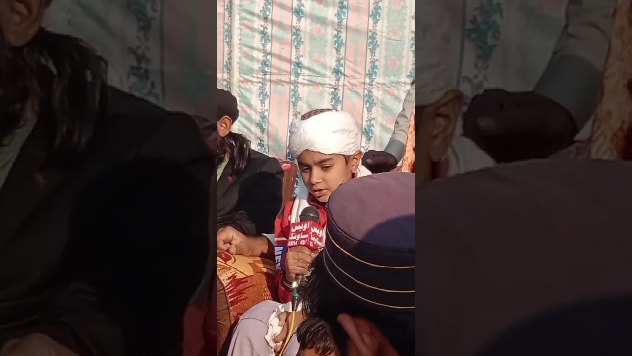  ننھا  طالب علم قاری محمد احمد مدنی عظیم نعت خواں ظفر شہزاد گجر صاحب کی موجودگی میں تلاوت کر رہا ہے۔