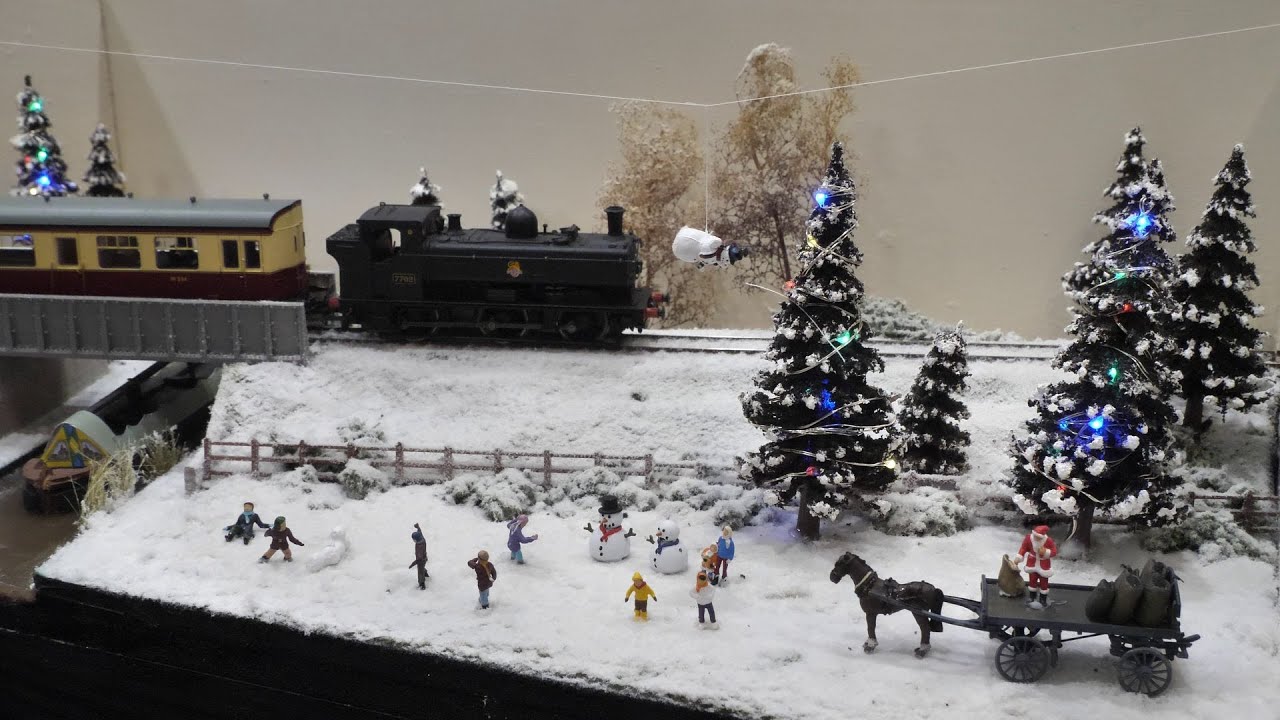 The snowman a winter scene - featuring Santa claus in OO gauge