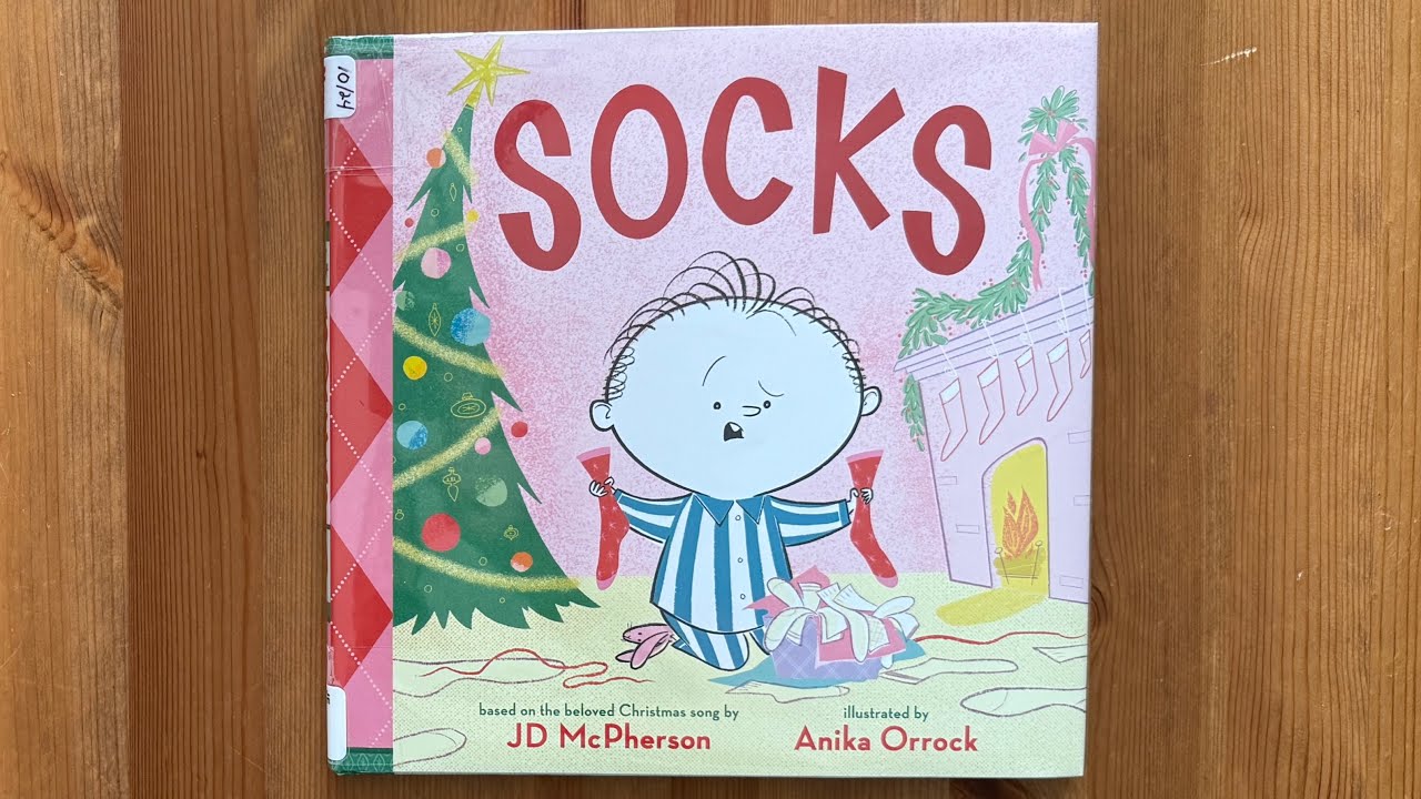 Ash reads Socks: A Kid's Christmas Lament by JD McPherson illustrated by Anika Orrock