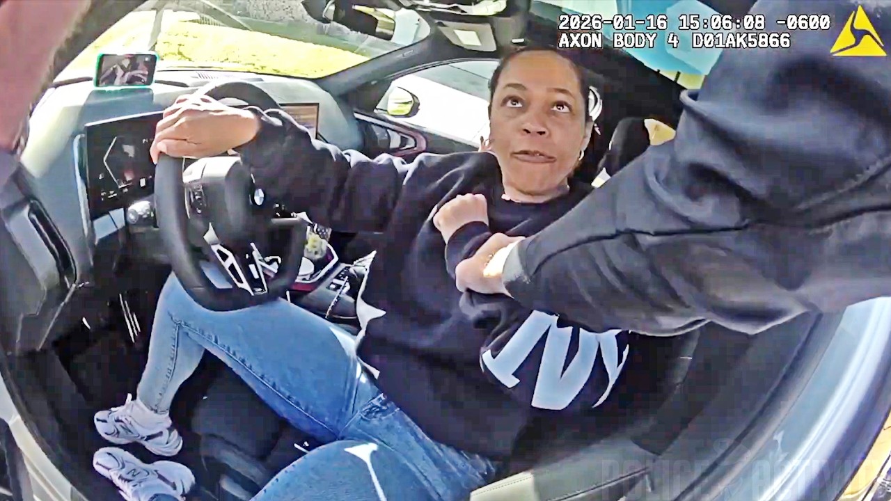 Officer Drags Woman From Car After She Refuses Ticket
