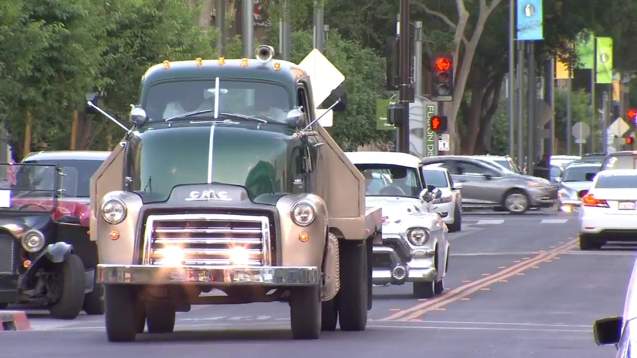 Hundreds of classic, custom and low rider cars and trucks dragging on Fulton Street