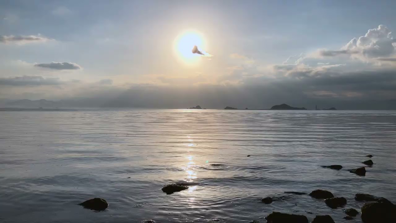 The morning sun shines on the shore   4K