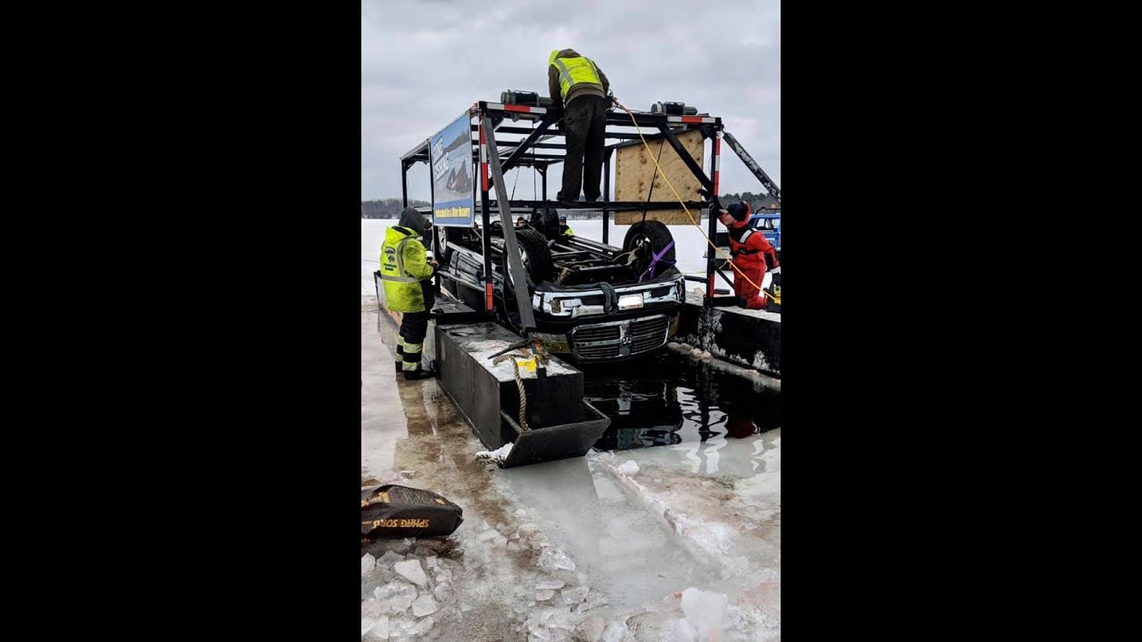 Two Trucks Break Through Ice And Are Pulled From The Bottom