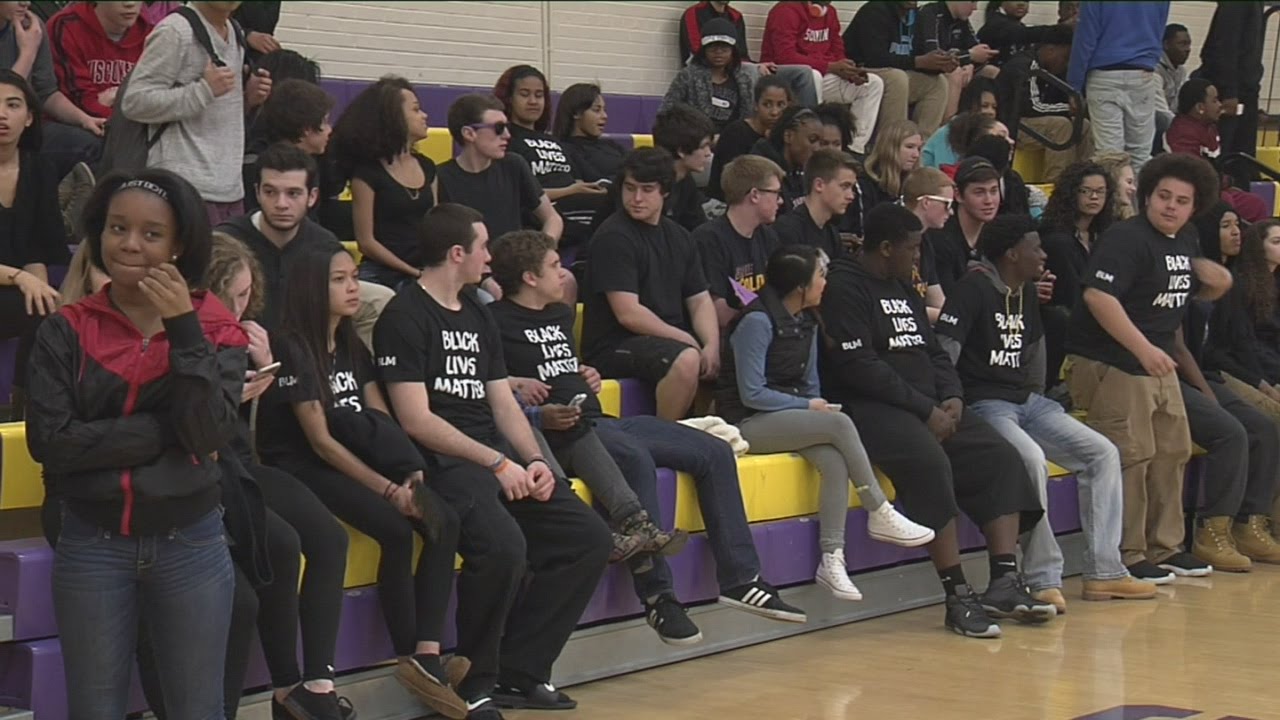Players, students wear 'Black Lives Matter' shirts during Madison East basketball game