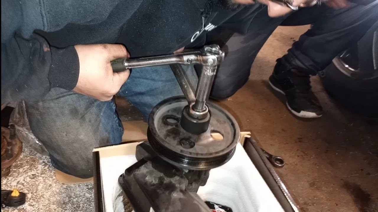Como sacar y meter la polea del power steering pump