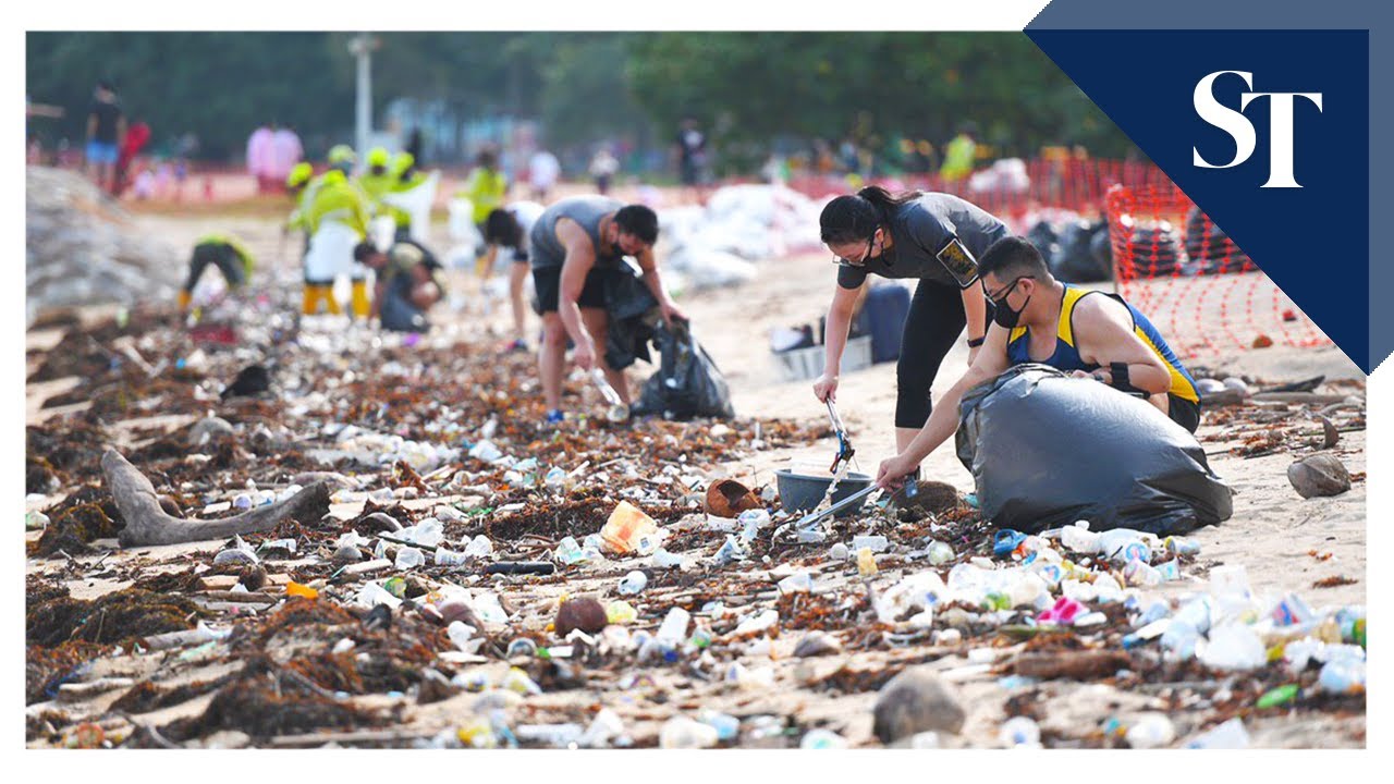 Volunteers pick up trash at East Coast Park beach