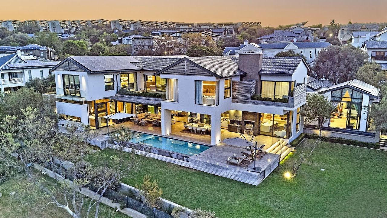 Bespoke Masterpiece in Helderfontein Estate: Architectural Excellence with Riverfront Views