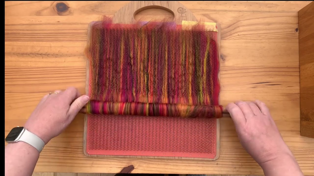 How to Make a Kind of Pencil Roving from Multicoloured Blended Top Using a Blending Board.