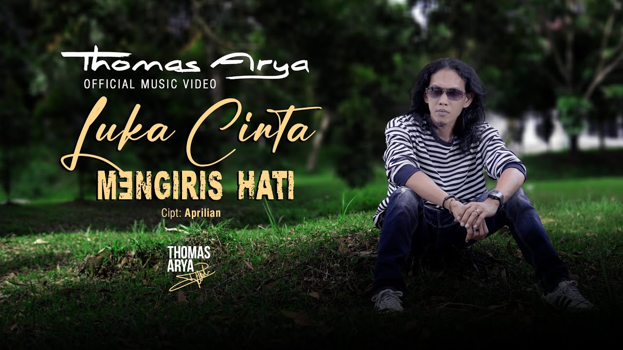 Thomas Arya - Luka Cinta Mengiris Hati ( Official Music Video )     Tak Sanggup Aku Menahan