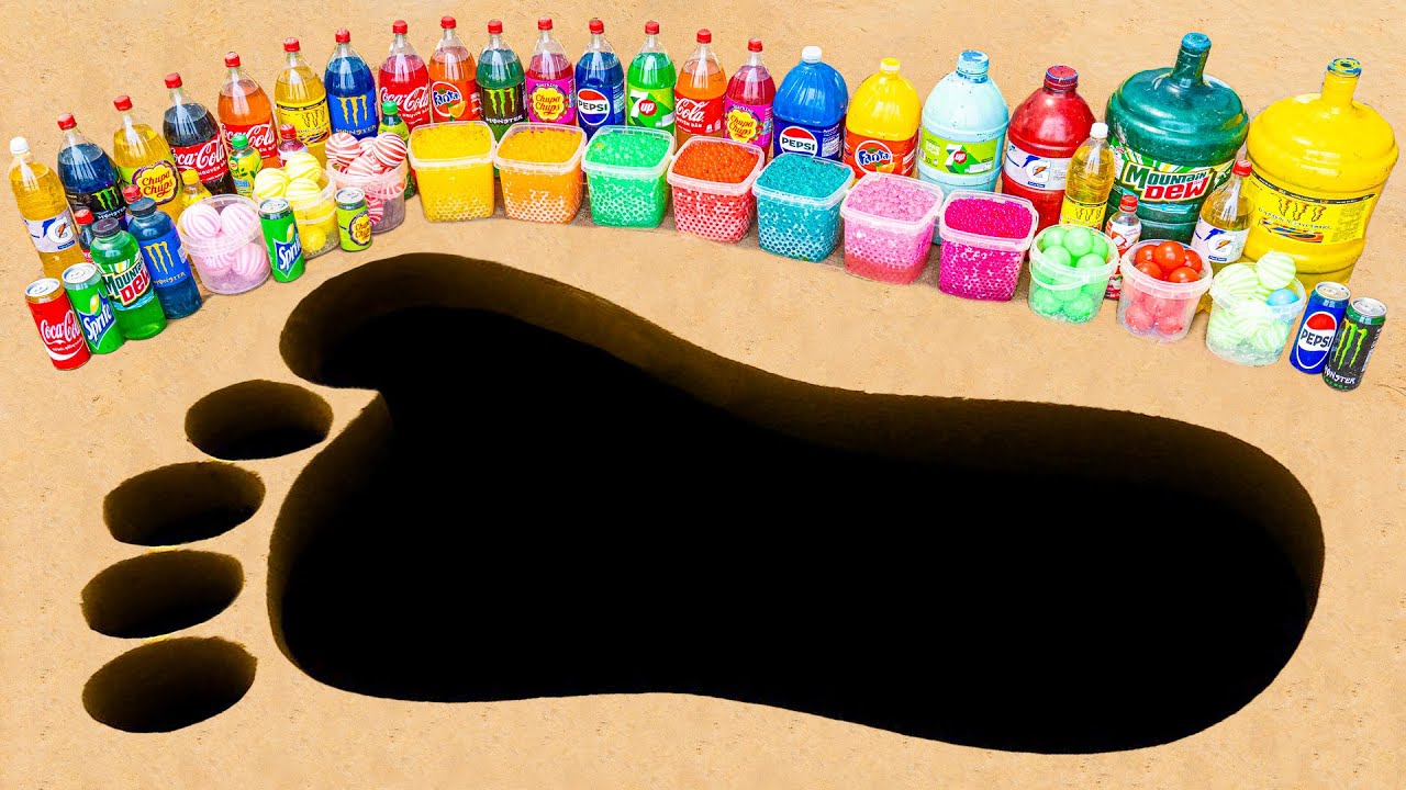 Experiment: Monster Footprint Sand Pit with Coca Cola, Fanta and Orbeez