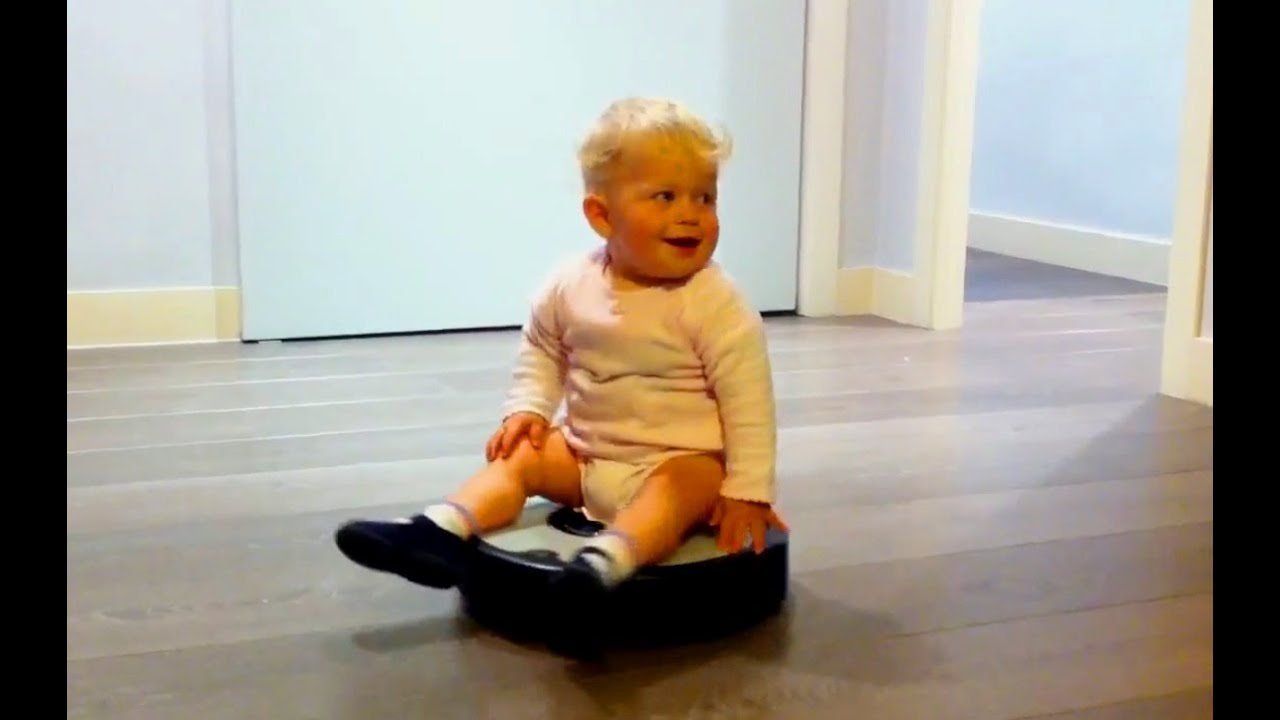 Babies Riding Roombas
