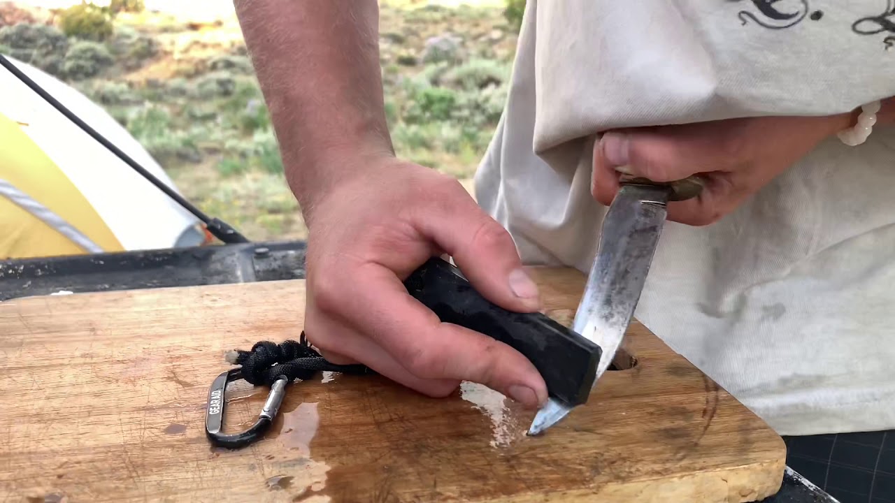 Fixing a rusty knife using the Jasper Viking Whetstone Pendant by NaturalWhetstoneSharpening.com