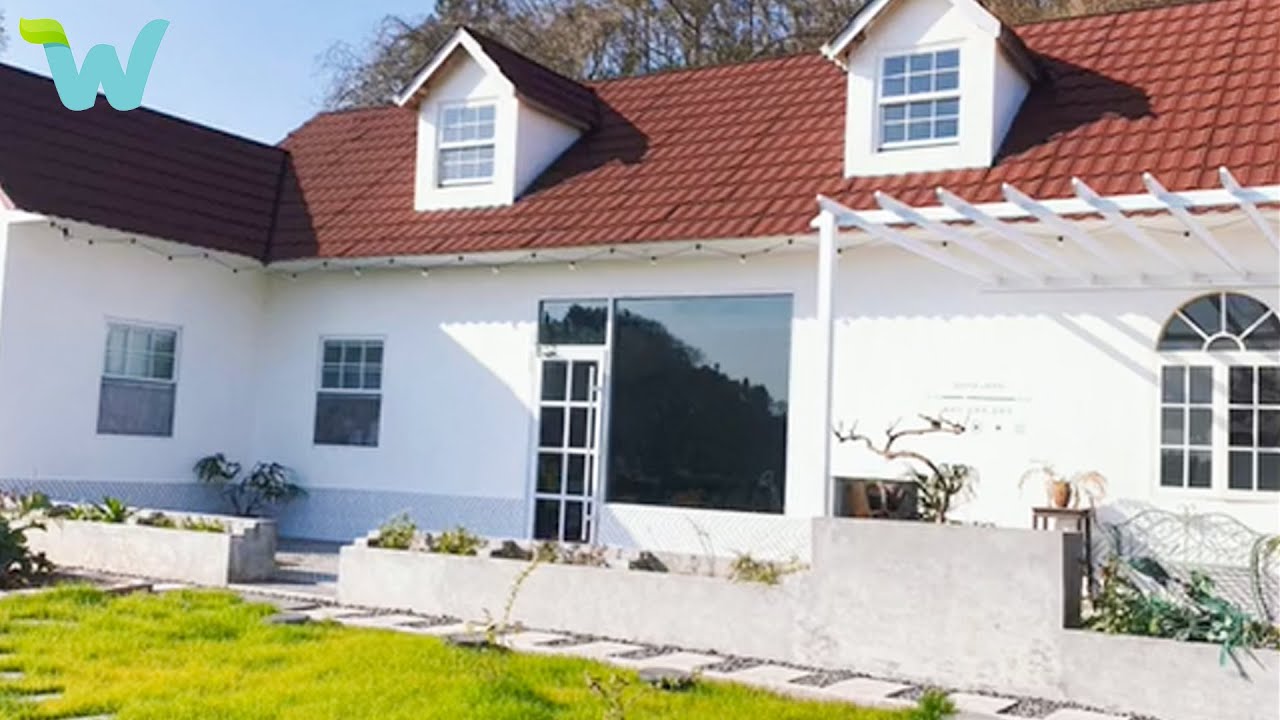 The couple renovate the 5 hectare land on the hill .  Planting flowers and vegetables..
