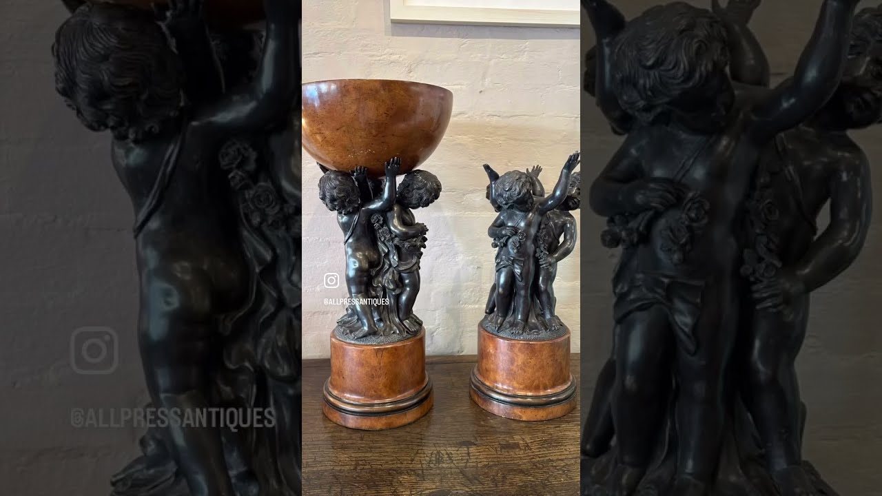 A charming pair of Italian bronzed Renaissance-style putti figures