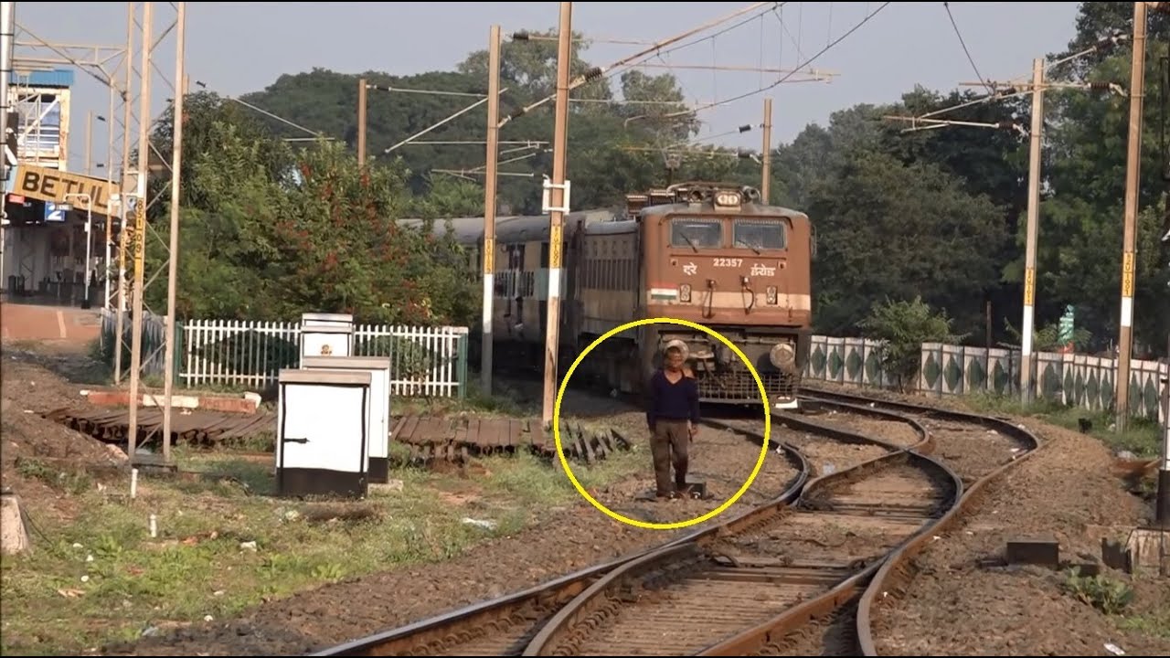 Mighty Grand Trunk Express Warns Drunk Unstable Character Trying To Carelessly Cross Railway Track !