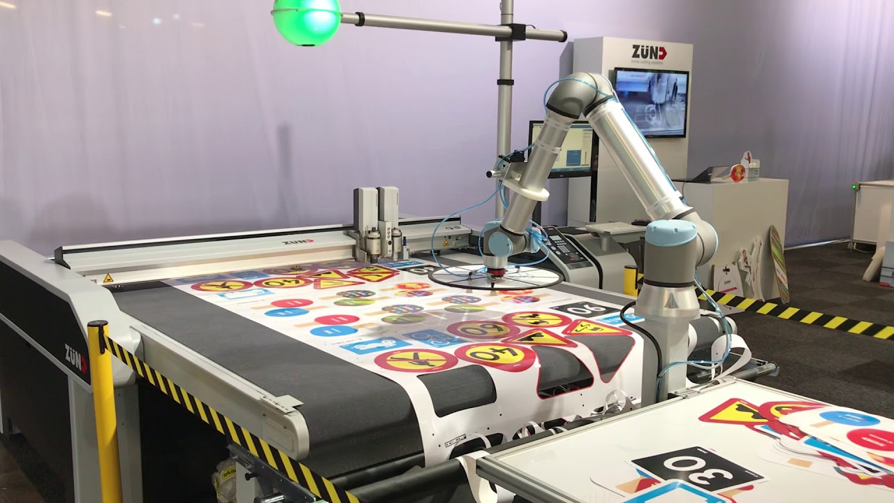 Z&uuml;nd S3 with robot for fully automated vinyl cutting from roll