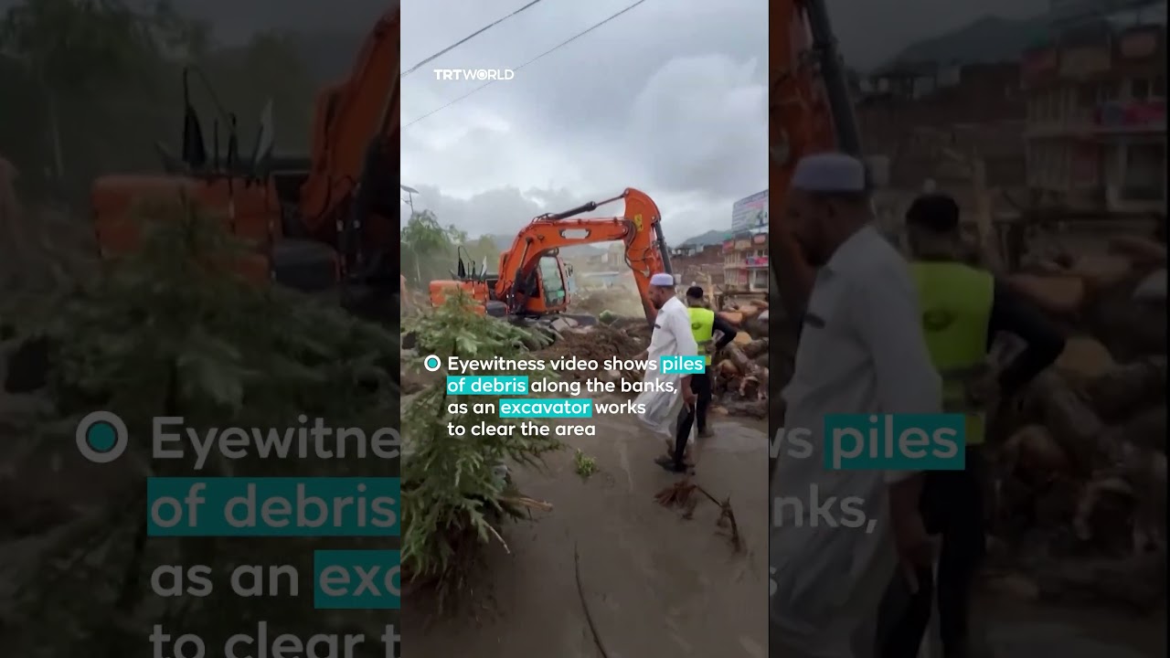 Floodwaters and debris surge through Pakistan's Mingora