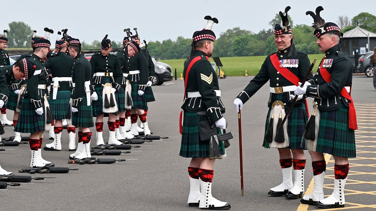 Kilted Royal Guards prepare for duty at Holyrood Palace