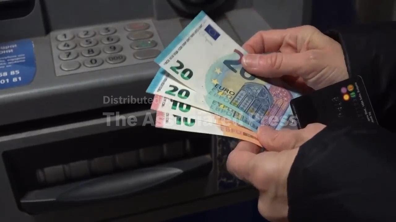 Cash machines in Bulgaria issue euros for the first time on day of joining the currency union