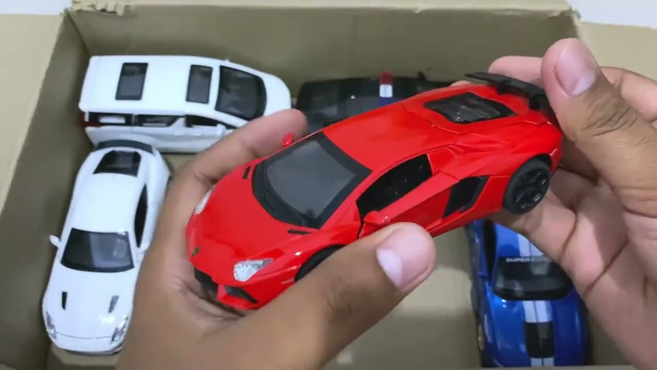 Box Full of Model Cars – Corvette Stingray, Lotus Evija, BMW M4, Audi R8, Lamborghini Revuelto