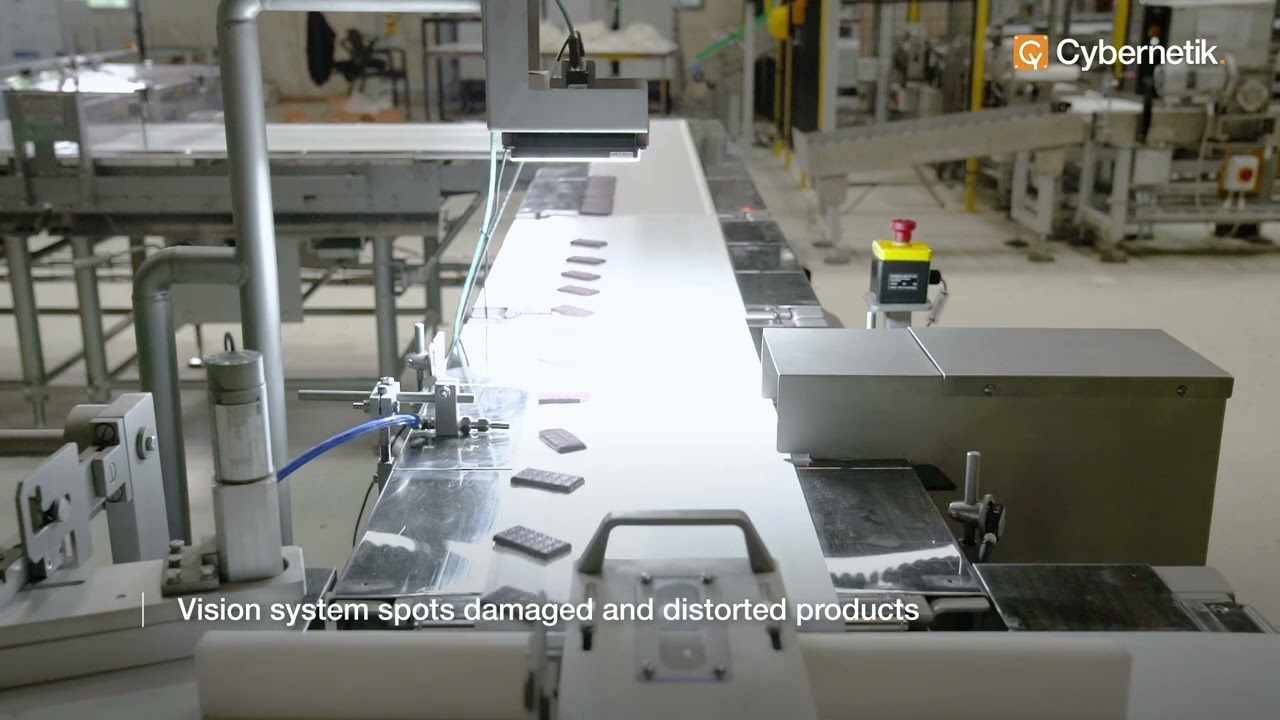 Flow Wrapper Feeding for Chocolate Bars | Cybernetik End of Line Automation