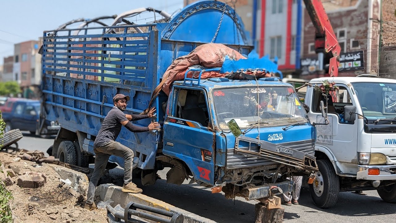 Mazda Truck Bad Accident ended up from Under. The Pakistani Mechanic fixed it