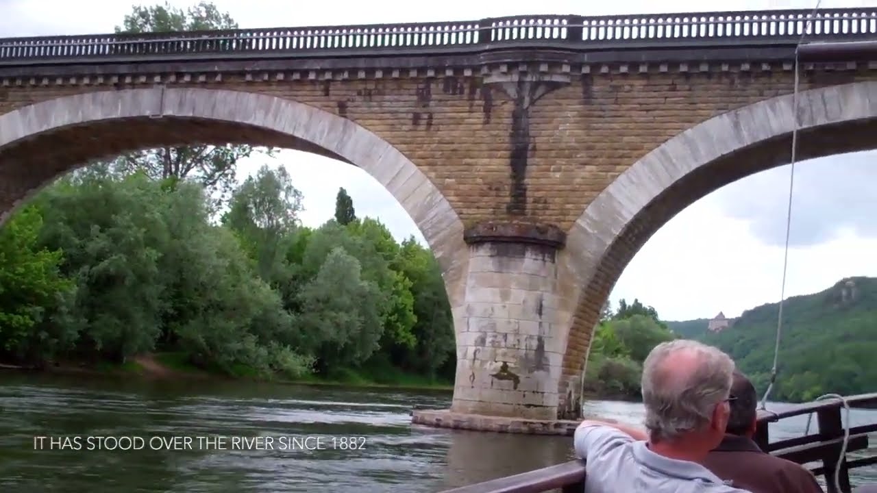 Boating the Dordogne River in France  Footage on the water with, bridges, and châteaus.
