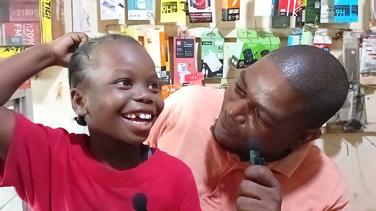 Fundimartin and a school girl from AIC MLD SCHOOL