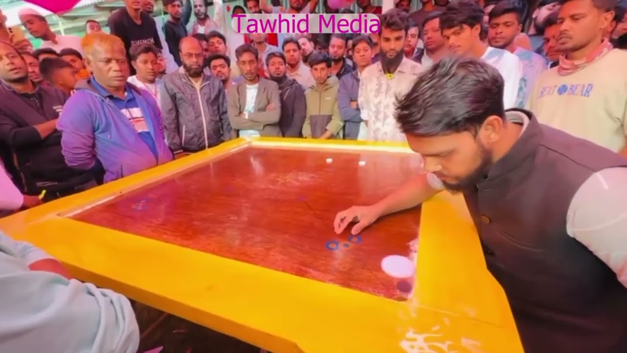 ফ্রিজ টু মনিটর ক্যারাম টুর্নামেন্টের ফাইনাল ম্যাচের ১ম গেম অংশগ্রহন করছেন নাগরপুর বনাম চৌহালী ।