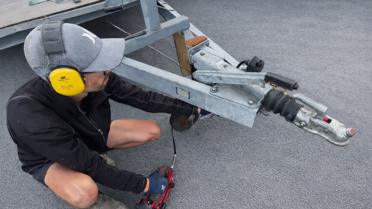 Trailer repair, changing a brake damper on a trailer