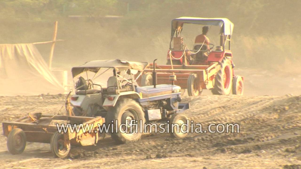 Excavators and tractors galore, on the Yamuna river flood plain in Delhi