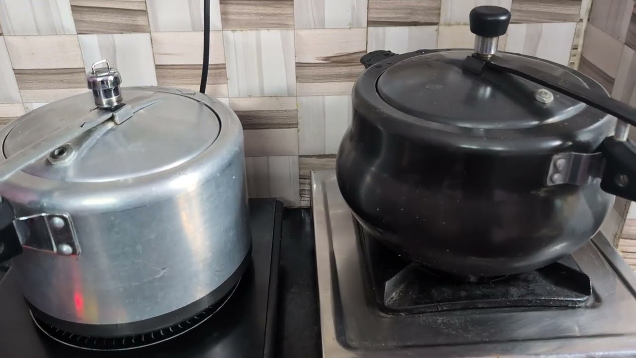 Pressure Cookers whistling together. 4 cookers in action - whistling together