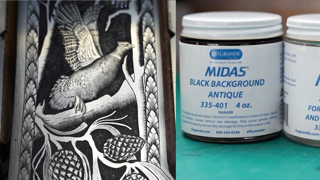 Testing Black Midas Black Background Antique on Hand Engraved Hatchet