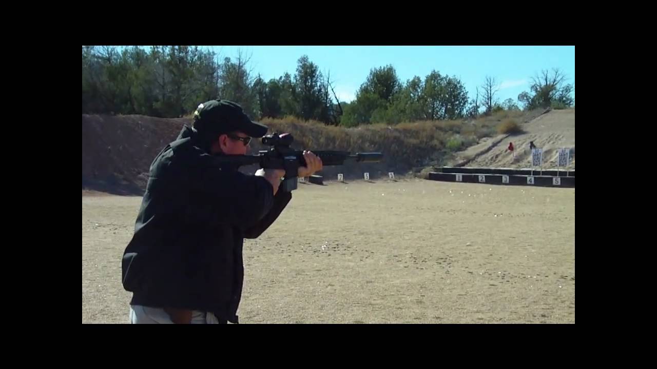 Ruger SR-556 with Surefire suppressor