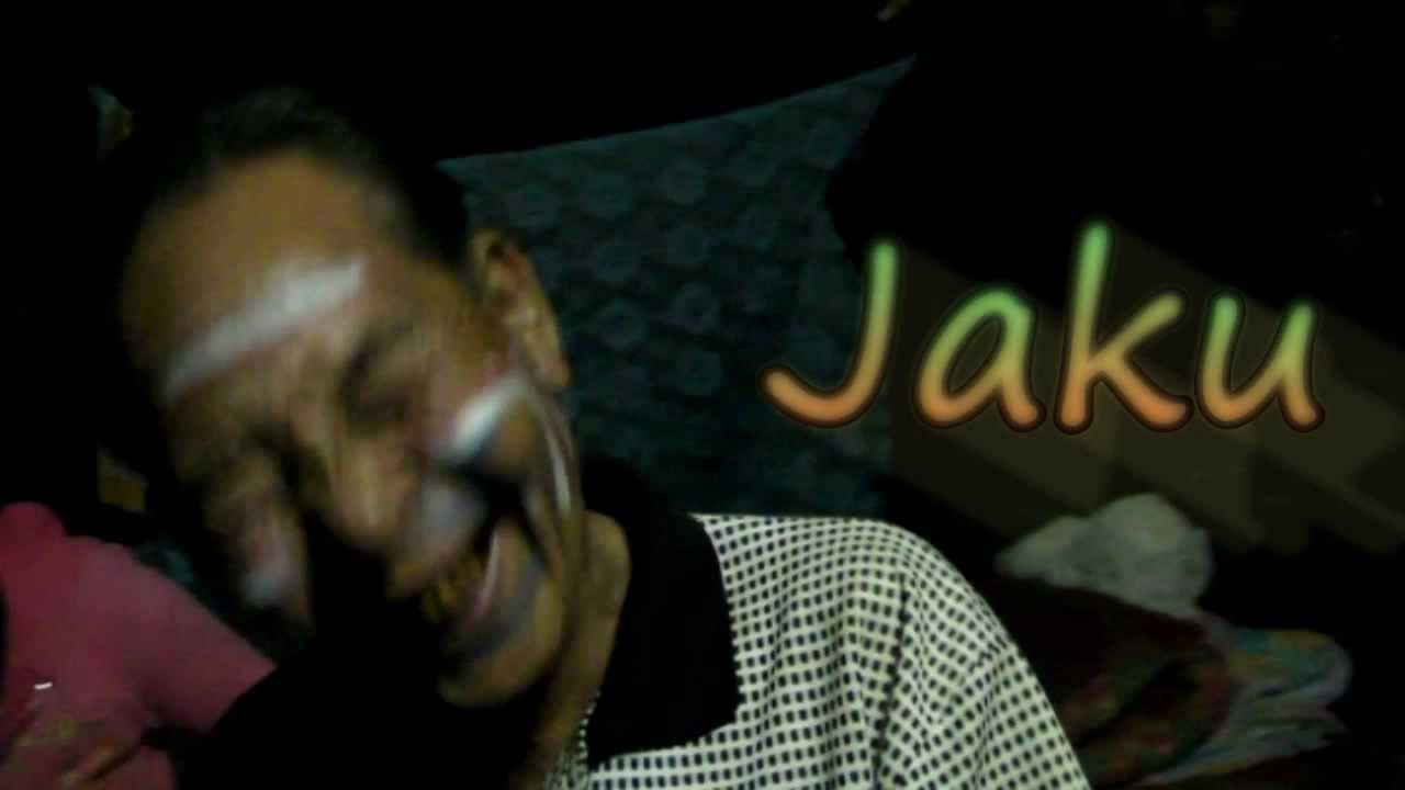 Jaku the Shaman - His magic laugh and flute - Lahu Hill tribe in Thailand.