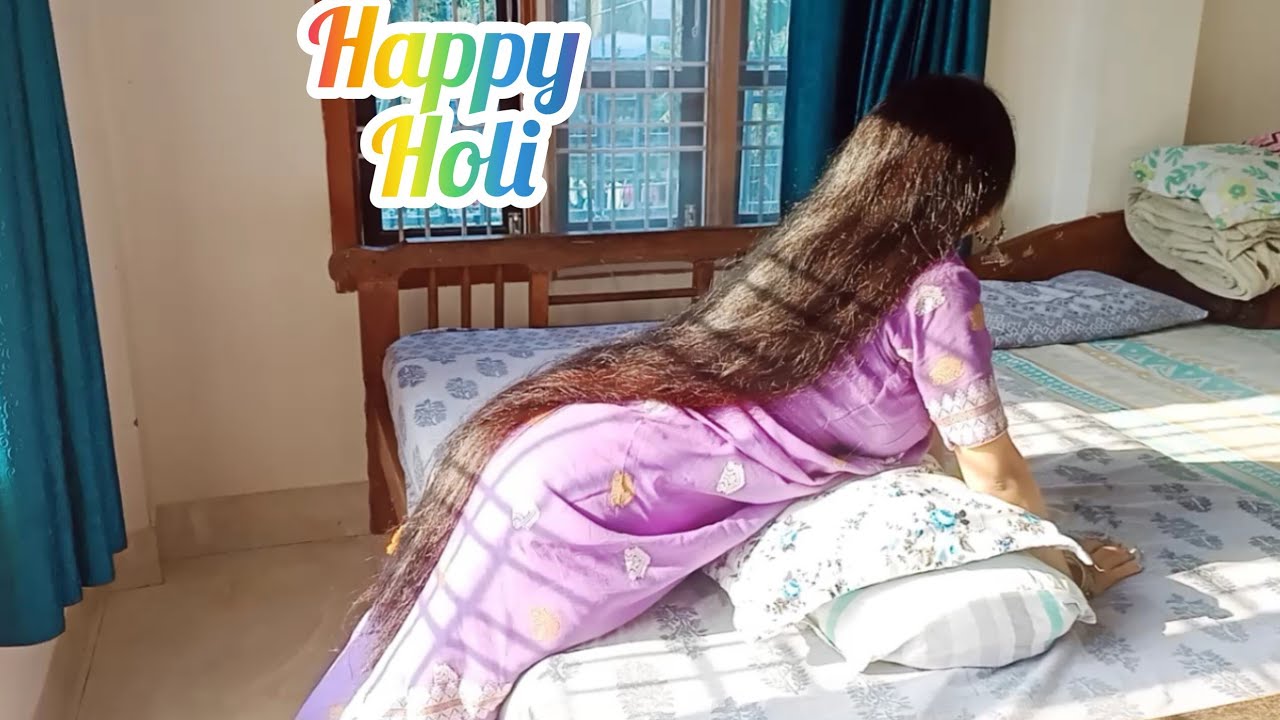 Freshly washed and drying long hair in sunlight 