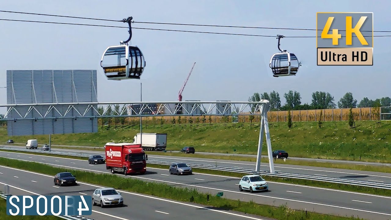 Kabelbaan gaat over de drukke snelweg A6 bij Almere | Gondel testritten Floriade